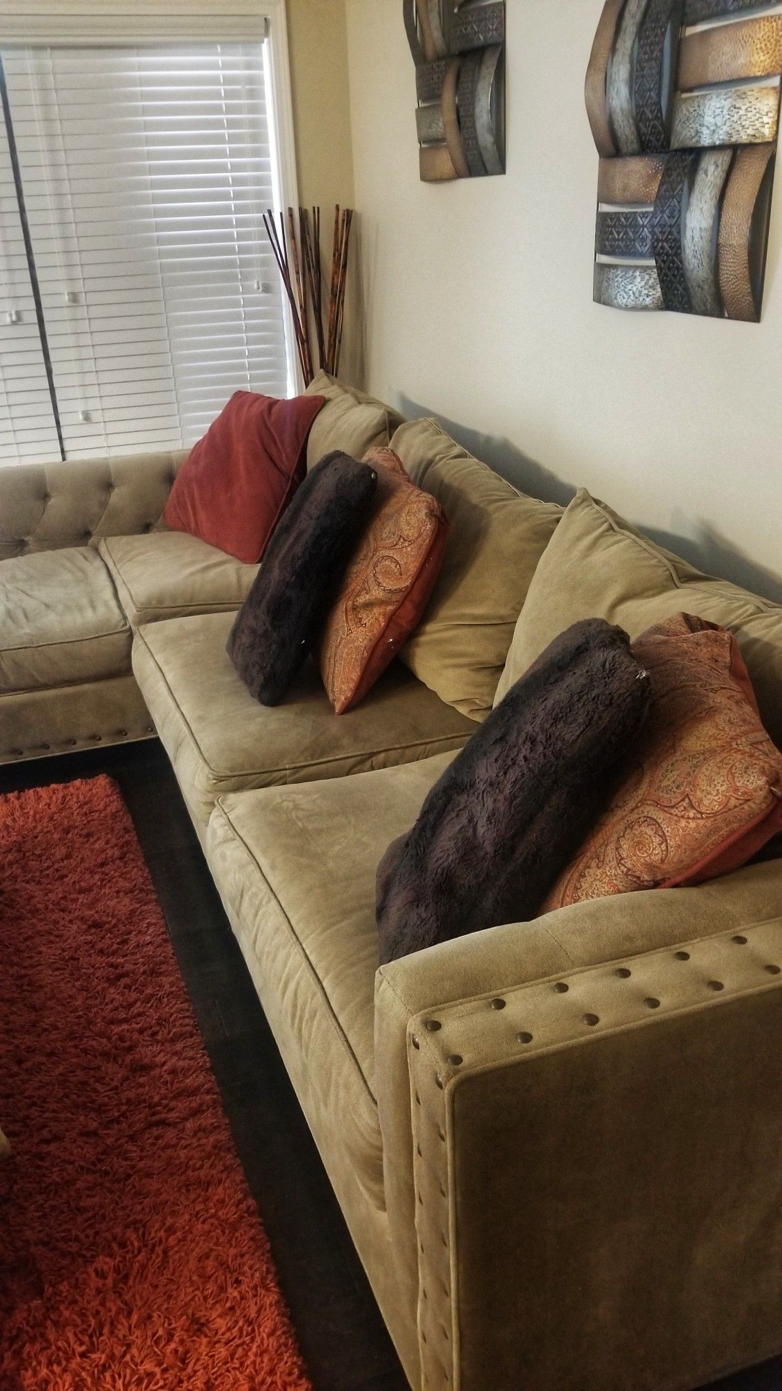 Sectional couch, Ottoman, Rug and Lamp.
