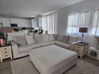 White sectional with oversized ottoman