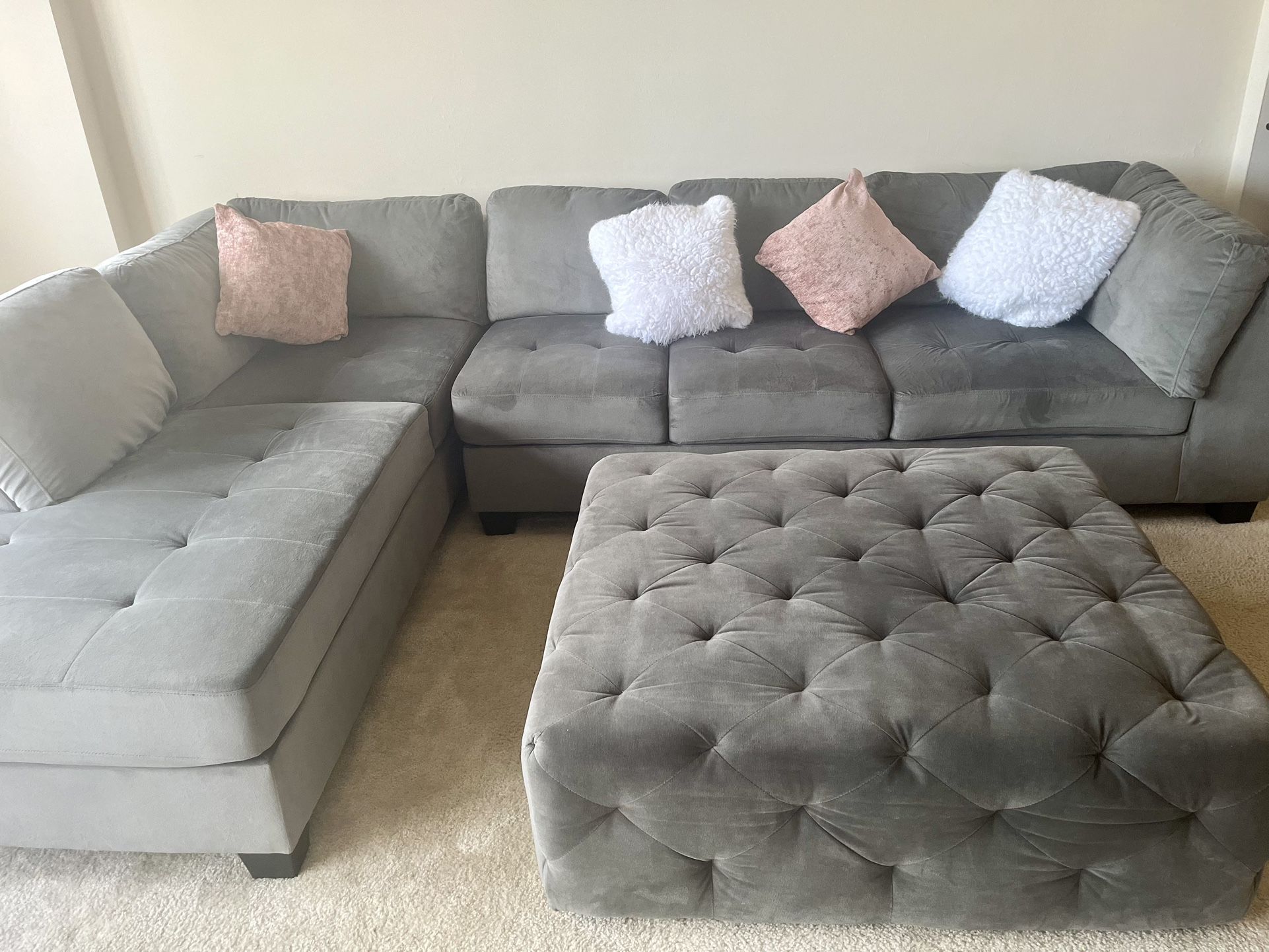Sectional Gray Color Couch With An Ottoman