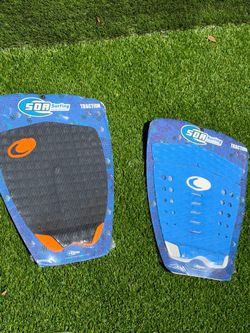 Surfboard pad traction