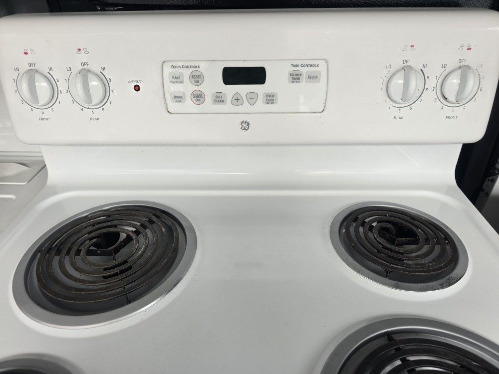 5 year old "30" inch wide coil top, self cleaning electric stove. Stove is in excellent working/cosmetic condition!