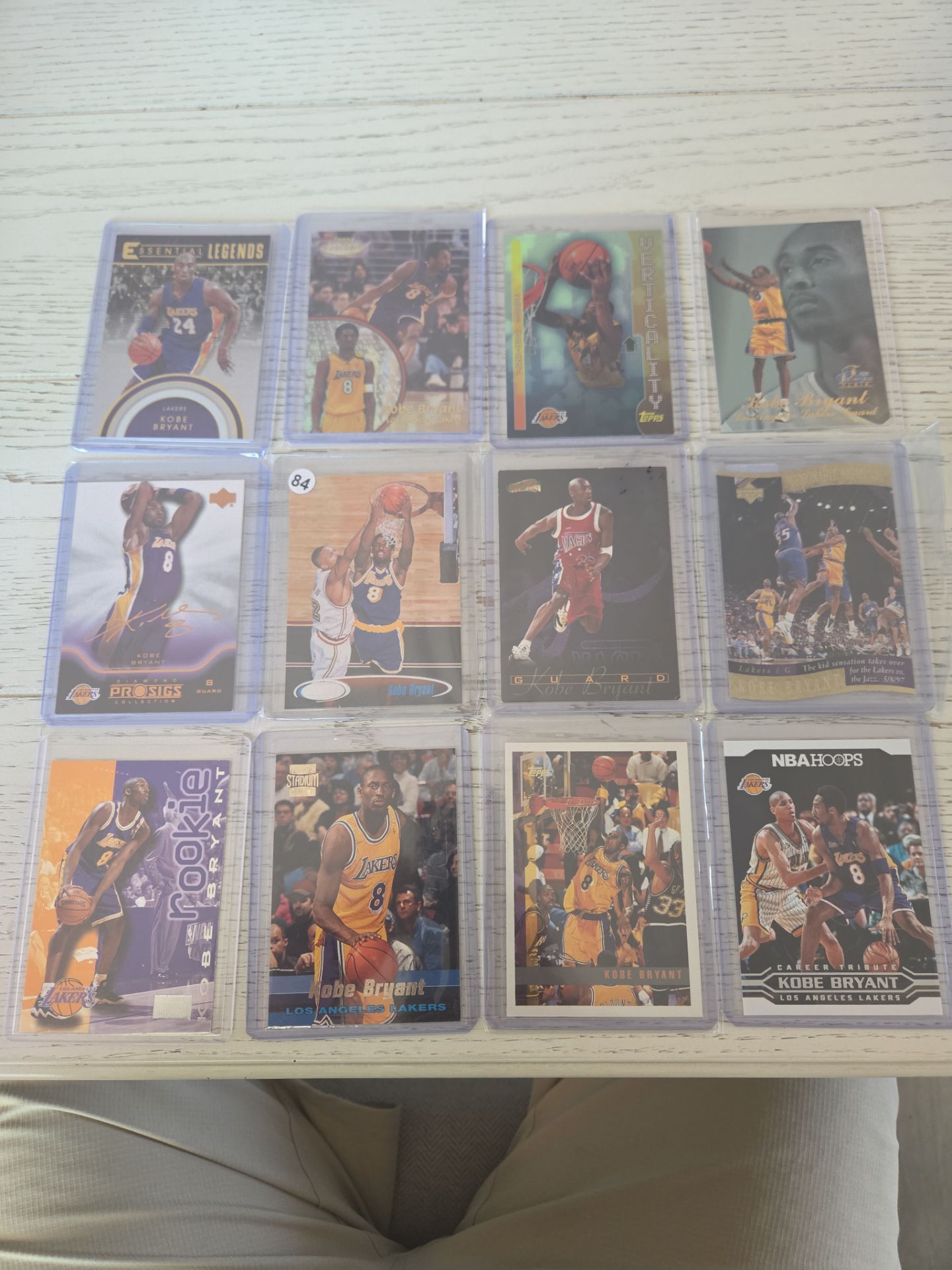Kobe Bryant rookie/mid era trading cards.