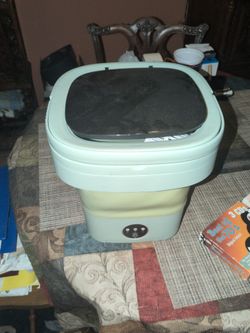 mini washing machine I think for traveling. great for your camper or when you go camping