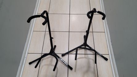 2 GUITAR STAND IN EXCELLENT CONDITION IN BLACK COLOR. 15 each 25 for both.