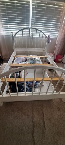 Very nice full size bed with Drew's underneath