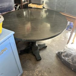 Table And Three Chairs 