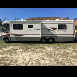 32 ft Rv with slide. Less than 65,000 miles