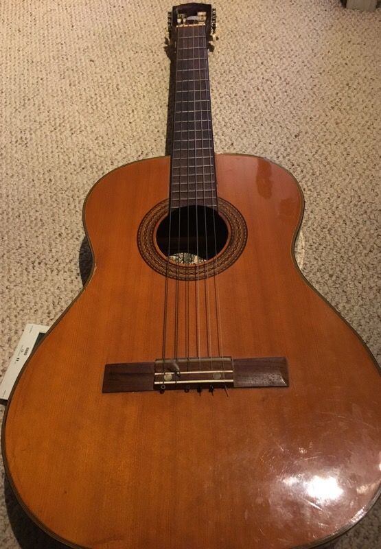 Conqueror acoustic guitar with tuner