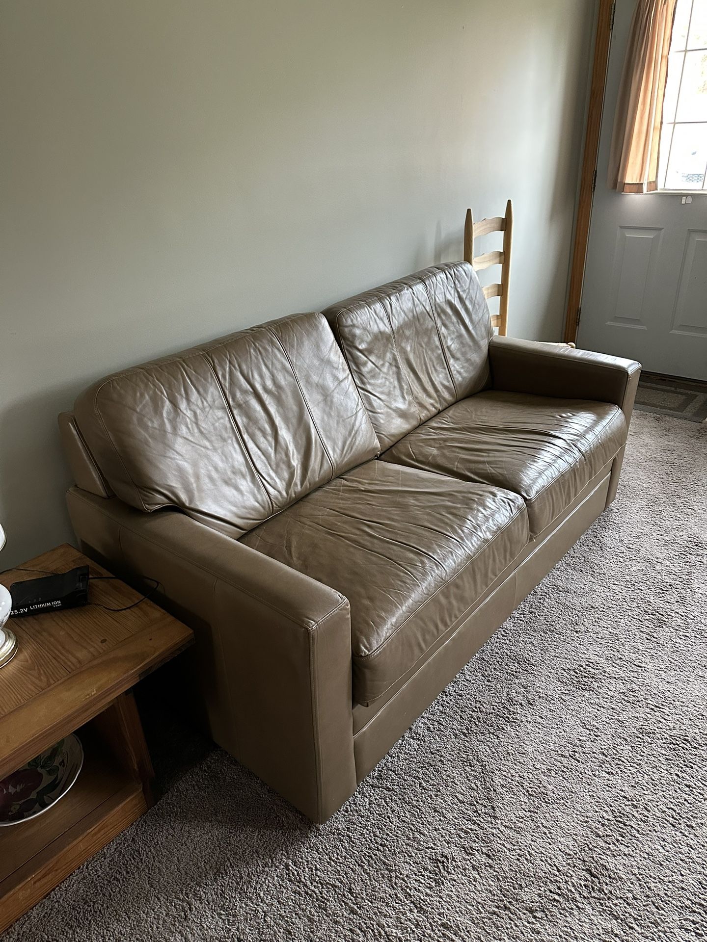 Brown Leather Pull-out loveseat