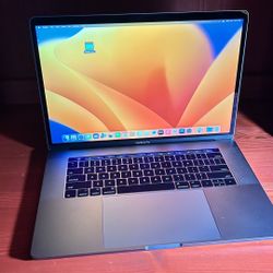 Apple MacBook Pro 15” Retina, Touch Bar, I7, 16GB RAM 512GB SSD macOS 13 Ventura $460