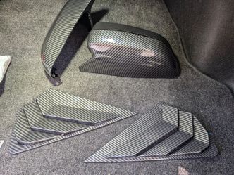Carbon fiber trims mirror covers etc ((See description))