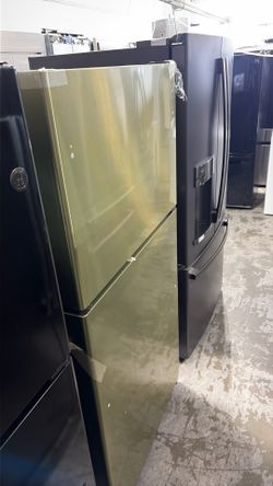 Top freezer refrigerator GE stainless steel