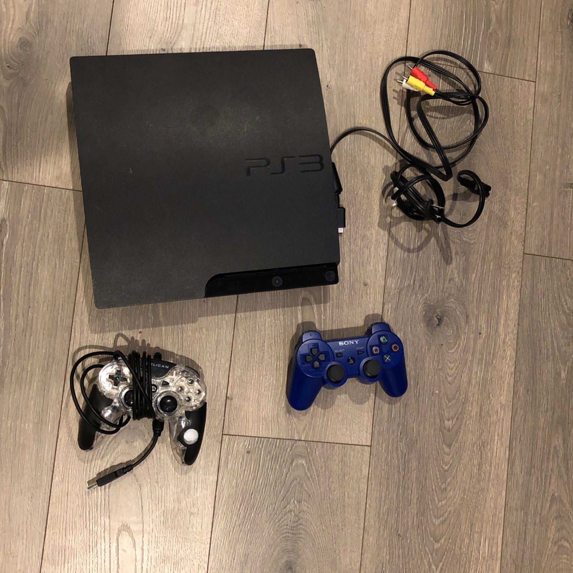 PS3 Slim With 2 Controllers