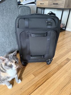 Tumi Merge Continental Front Lid 4 Wheeled Carry-On (Expandable). $300