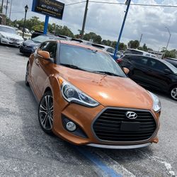 2016 Hyundai Veloster 3dr Cpe Auto Turbo|66,749 Miles|Front Wheel Driveorange Exterior with Black Leather Interior | 1.6 4 Cylinder Engine |Automatic 