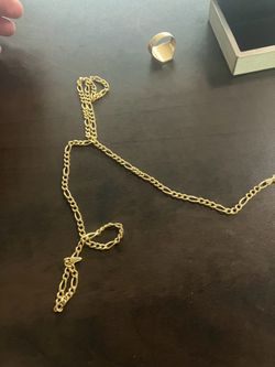 21K solid Figaro chain.