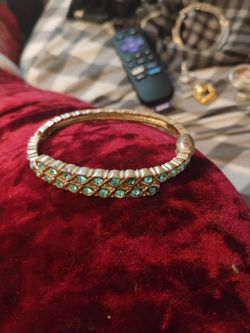 Gold-Tone Bangle Bracelet with Green Stones