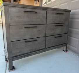 Gray dresser with 6 drawers