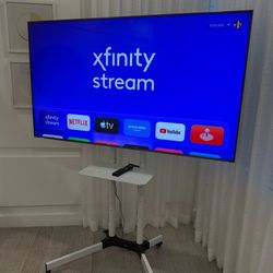 Sony Bravia 65” 4K Smart TV with Rolling Stand. Model XBR-65X900F. Excellent condition.