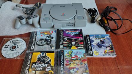 Super clean PlayStation 1 bundle six games and controller