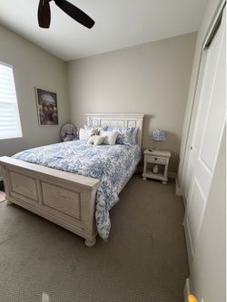 Ashley Furniture Queen Bedroom Set – Bed Frame + 2 Nightstands  Price: $700 OBO  Description: Beautiful Ashley Furniture queen bedroom set in excellen