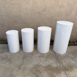 NEW Round Cylinder Pedestal Stands Set Of 4 for Cake Dessert, Flower, & Ornament - Party Display **Has dent & small chips**