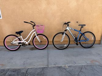His and hers bikes phat beach cruiser new 24” tires and novara 17” frame 24 speed 26” tires asking $200 for both