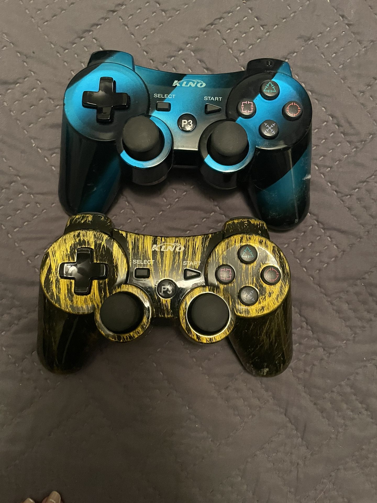 Two Klno PS3 Controllers Look New