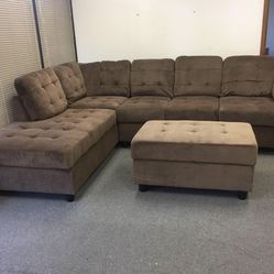 Gray linen sectional couch and ottoman