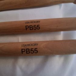 Two Pair Of Drumsticks 