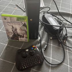 Xbox 360 with controller +cords and 3 games