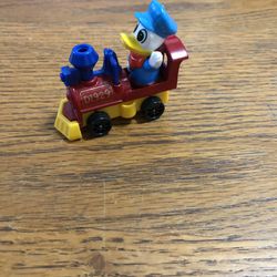 Vintage Walt Disney Productions Toy Train Locomotive With Donald Duck .  Size 2 1/4 inches Long .  Brand New Never Used 