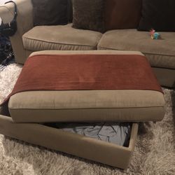 Ashley Signature Tan Sectional with Multicolor Pillows And Oversized Storage Ottoman 