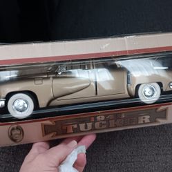 :18 scale diecast model of a 1948 Tucker Torpedo, produced by Road Signature or Road Legends. 