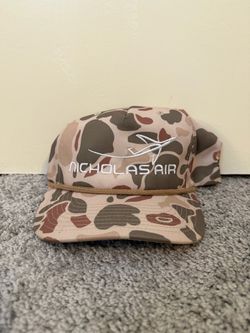 Nicholas air Dallas Safari Club 2026 camo hat