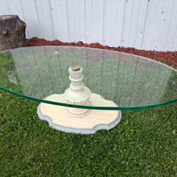 Beautiful 3/4" Glass top Coffee Table with Wood Base
Measures 4' x 2' 