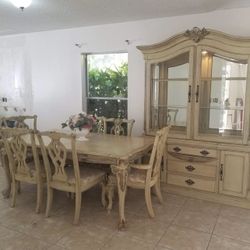 Dining room set comes with 6 chairs and table and cabinet