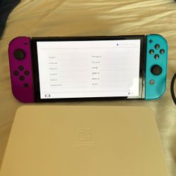 Nintendo Switch OLED + 128gb SD card