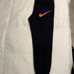 Nike Black Joggers with Orange & Blue Logo