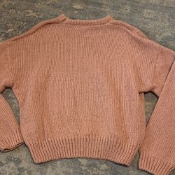 Light pink knitted sweater