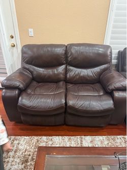 Brown leather sofa/couch