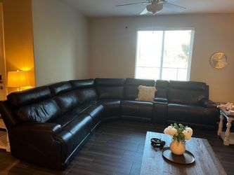 Brown leather sectional / recliners