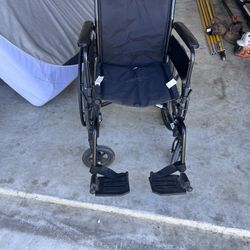 Wheel Chair With Leg Attachments 