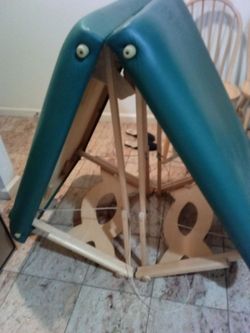 Foldable massage table