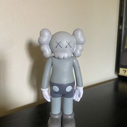 Kaws Figurine