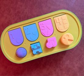 Fisher price hide and peel pop up toy