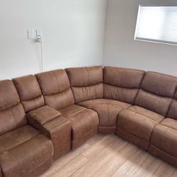 Beautiful Sectional Couch Kiall 96" W Faux Leather Console Power Reclining Sectional with Paid $1599 3 months