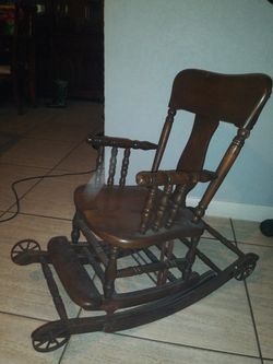 Antique Highchair/rocking chair.