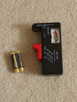Moving sale! Battery tester and batteries.