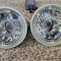 Pair Of 7 Inch Round Halogen Headlights With LED Accent Lights